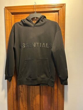Essentials Black Pullover Hoodie with Embossed Logo